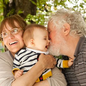 adopting a child advice - older couple with baby